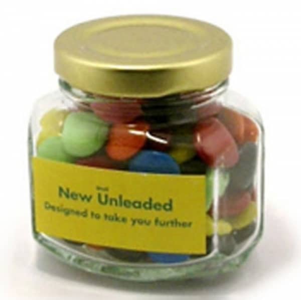 Branded Promotional Glass Squexagonal Jar With Choc Beans 90G